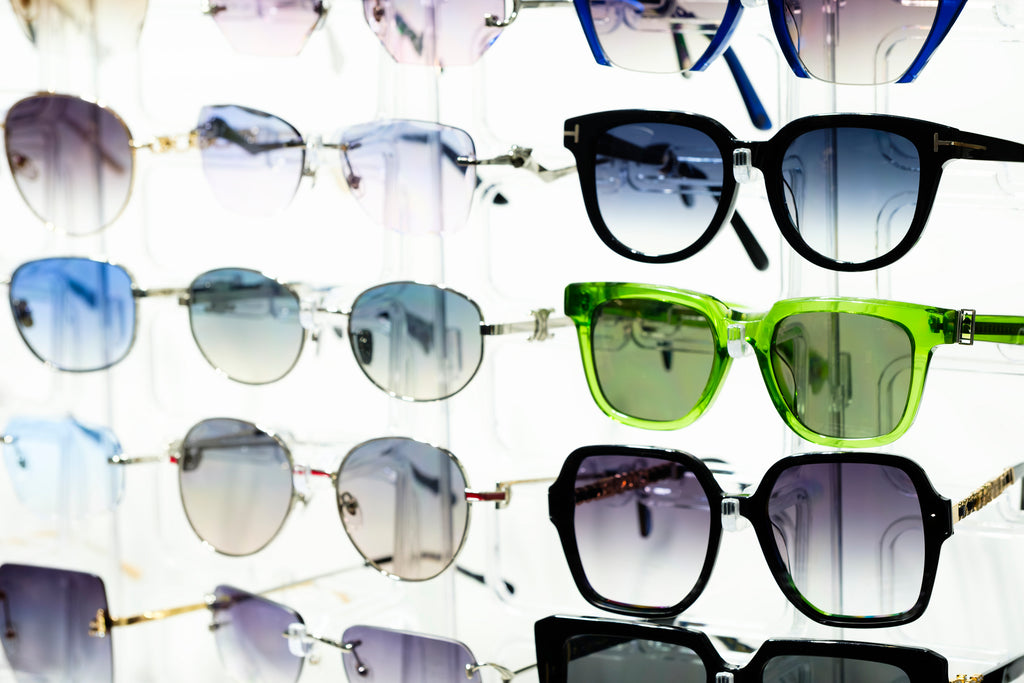 Glass vs Plastic Lenses: The Ultimate Showdown (Or Why Your Sunglasses Choice Is Like Choosing Between a Tank and a Sports Car)